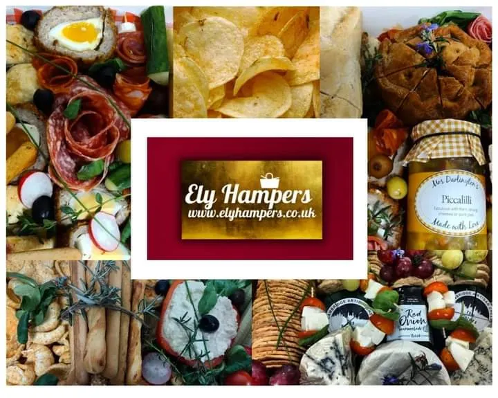 A grazing buffet table with charcuterie, cheese, fruit and breads