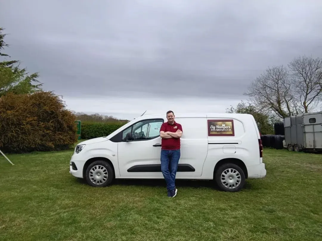 Paul delivering a wedding picnic to a marquee